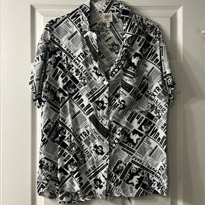 Short sleeve collared button down newsprint woman shirt size L